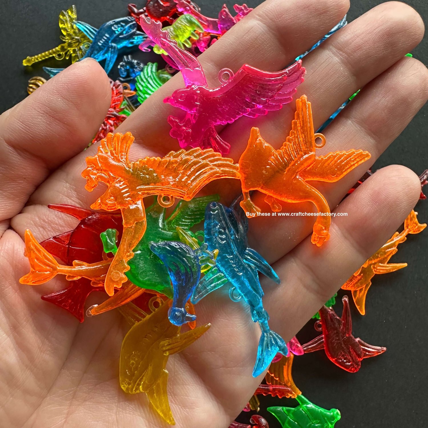 Vintage plastic toy charms dragons mythical creatures —