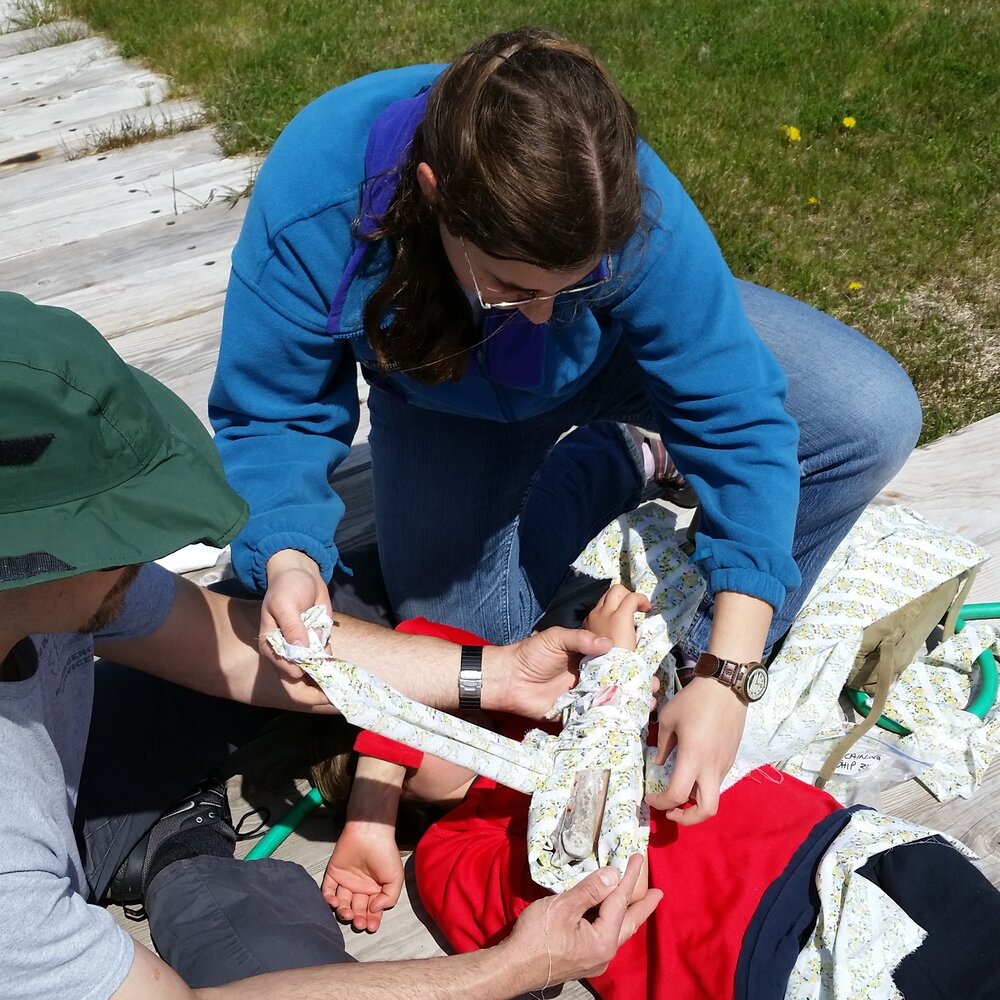  Learning first aid from a local EMT