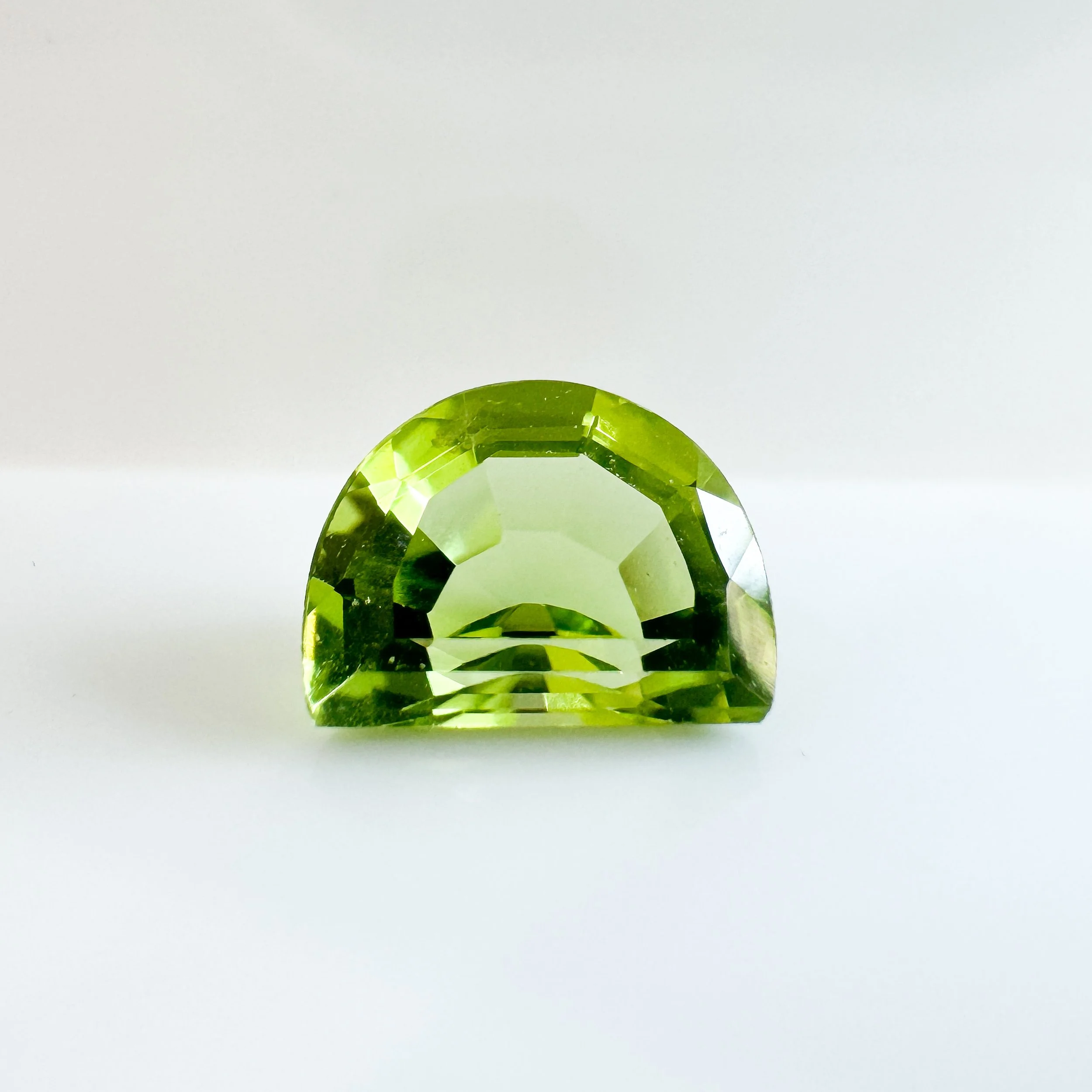 Half moon shape peridot