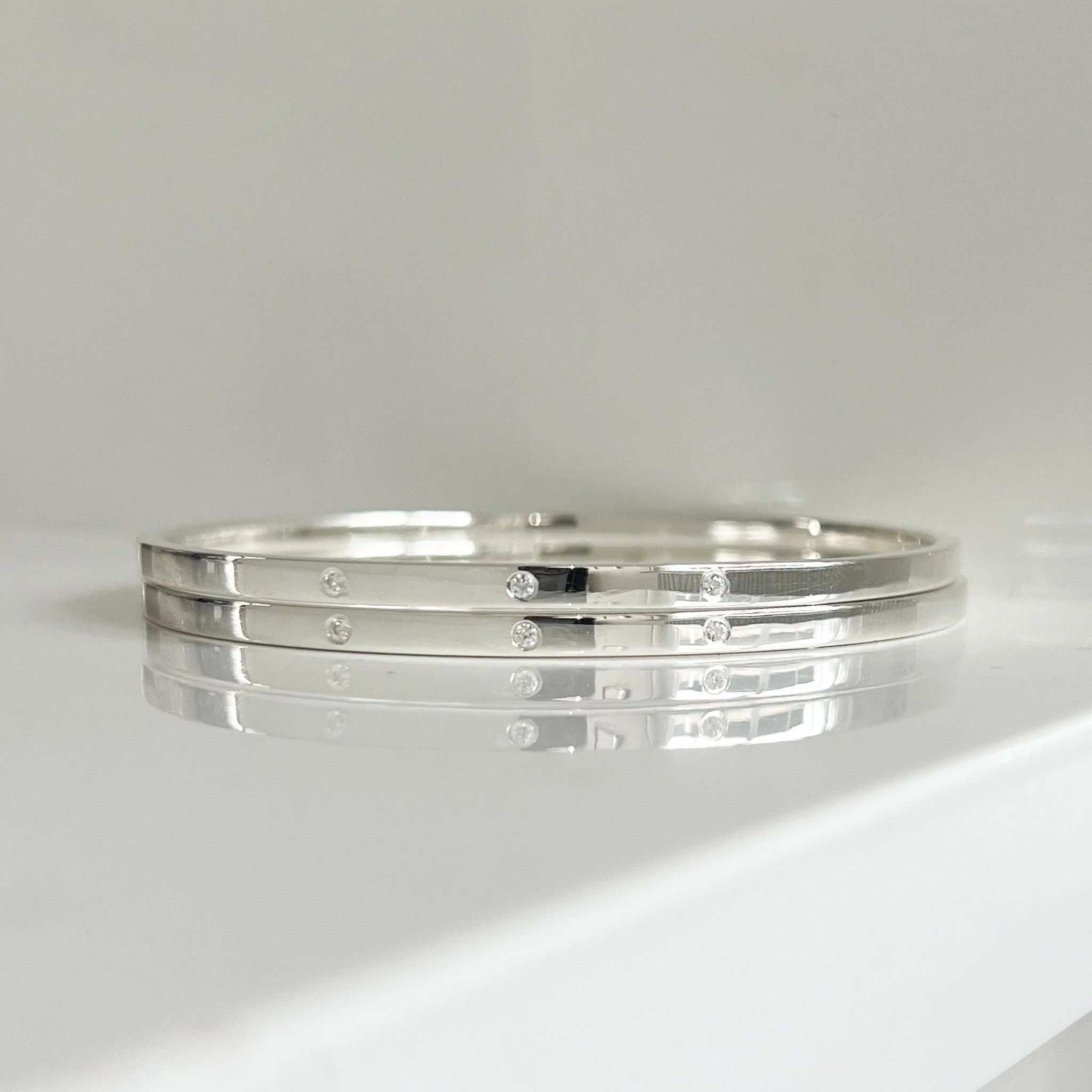 Silver flush set bangle