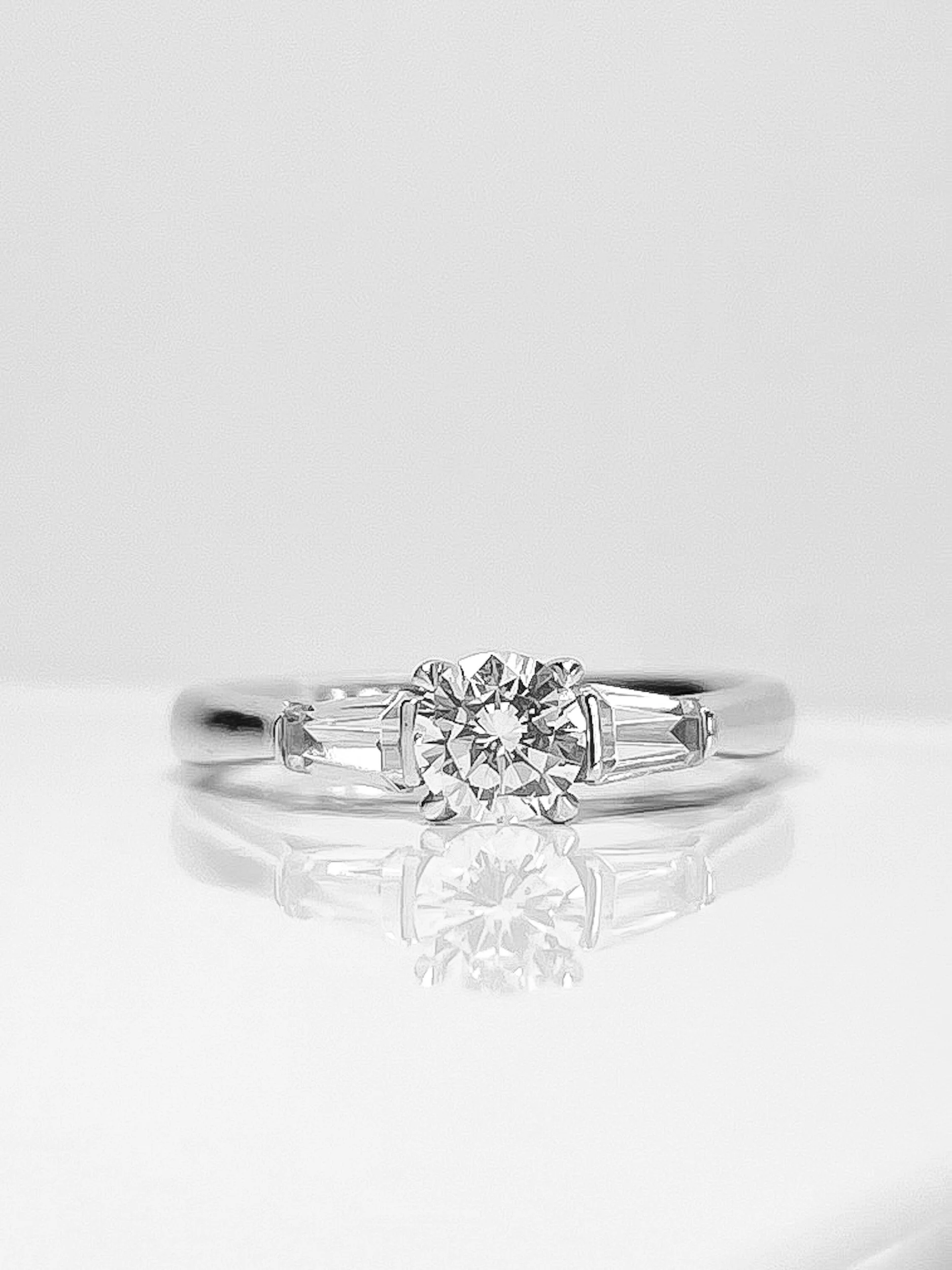 Round and tapered baguette diamond trilogy