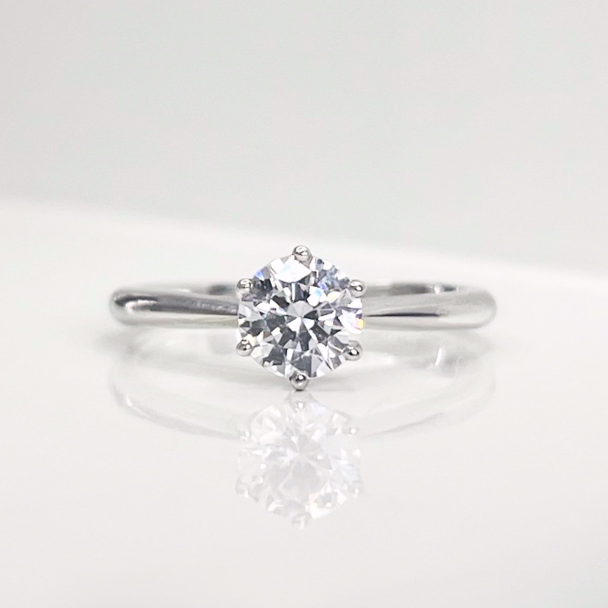 six-claw-brilliant-cut-diamond-engagement-ring-front.jpeg