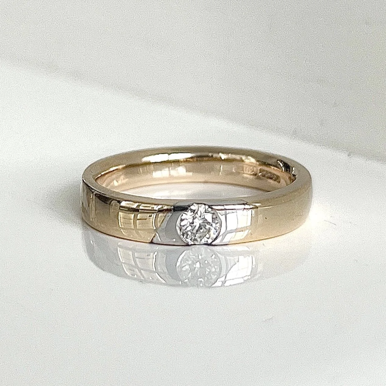 Yellow gold and diamond engagement ring