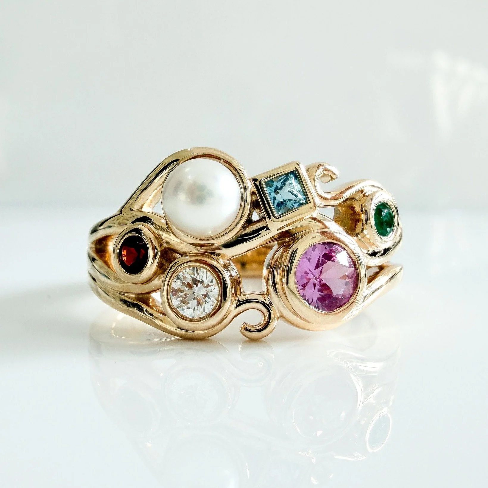 Family, captured in a ring✨

This National Families Day, we&rsquo;re sharing Lisa&rsquo;s story - a bespoke birthstone ring designed to hold the people she loves most, all in one piece.

From garnet to diamond, emerald to pearl, each stone tells part