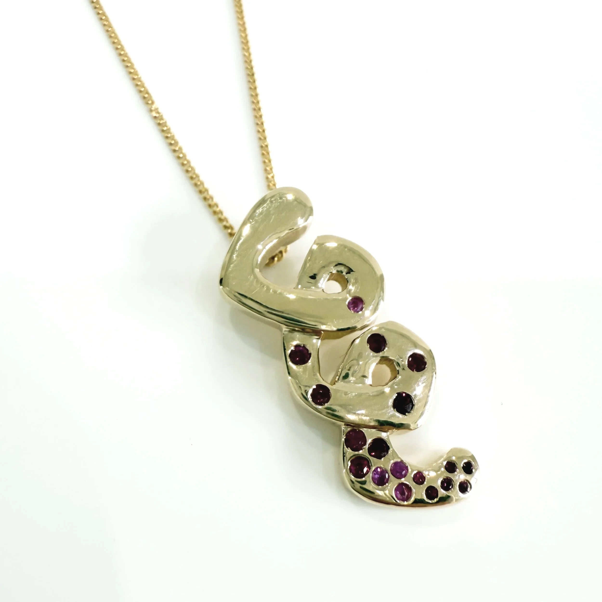 Ruby twist pendant designed by Abi