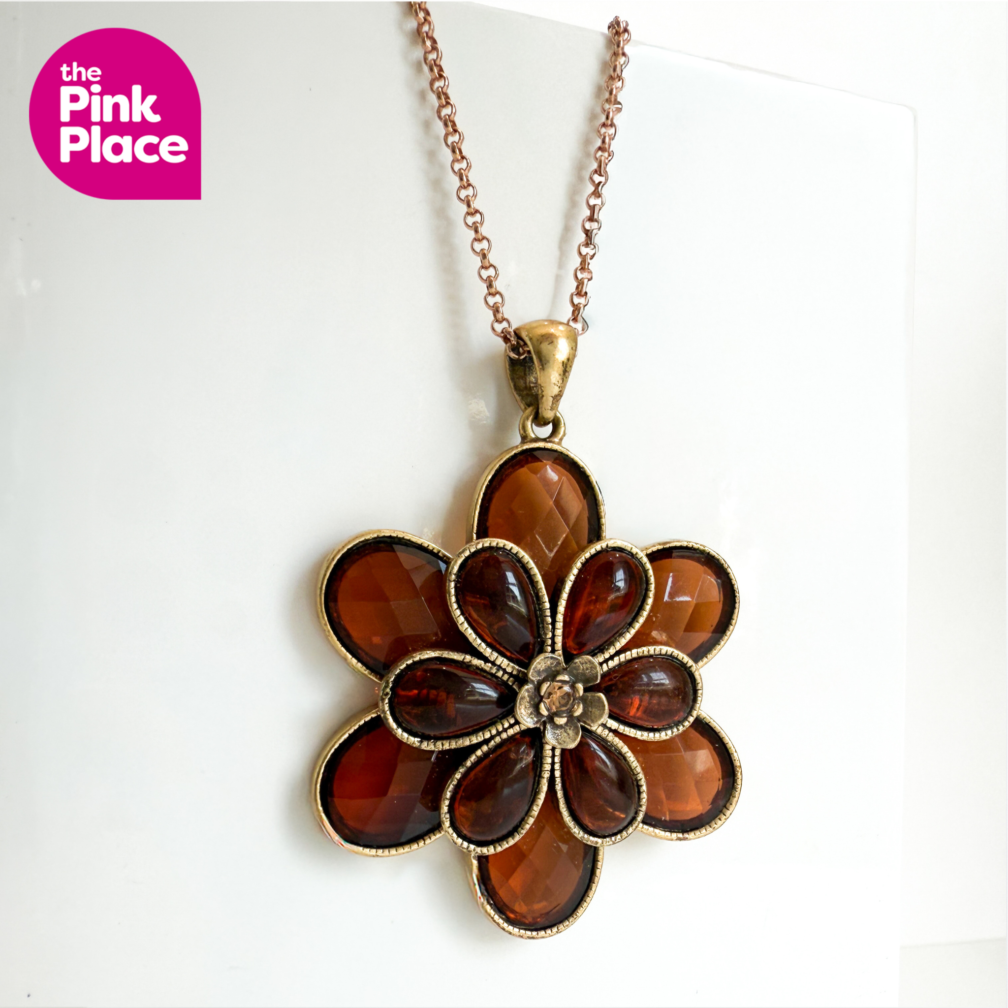 Orange-coloured-glass-flower-pendant-3.png