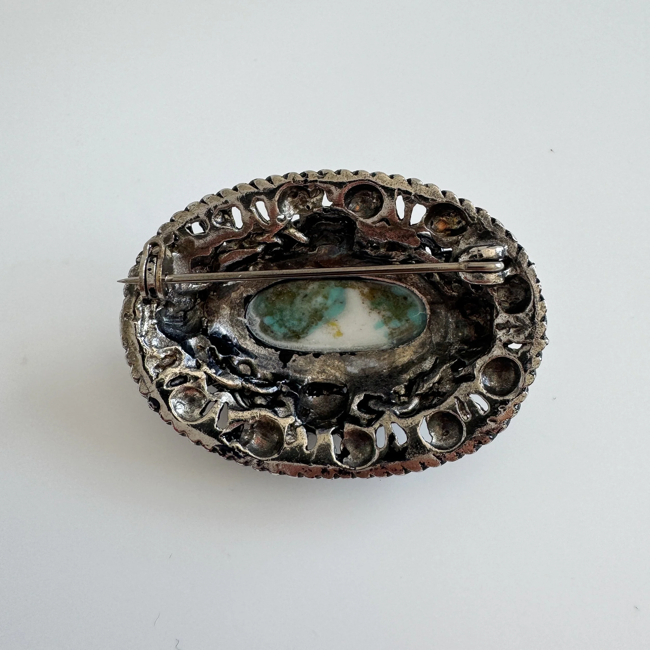 The back of the brooch, showing a pin fastening