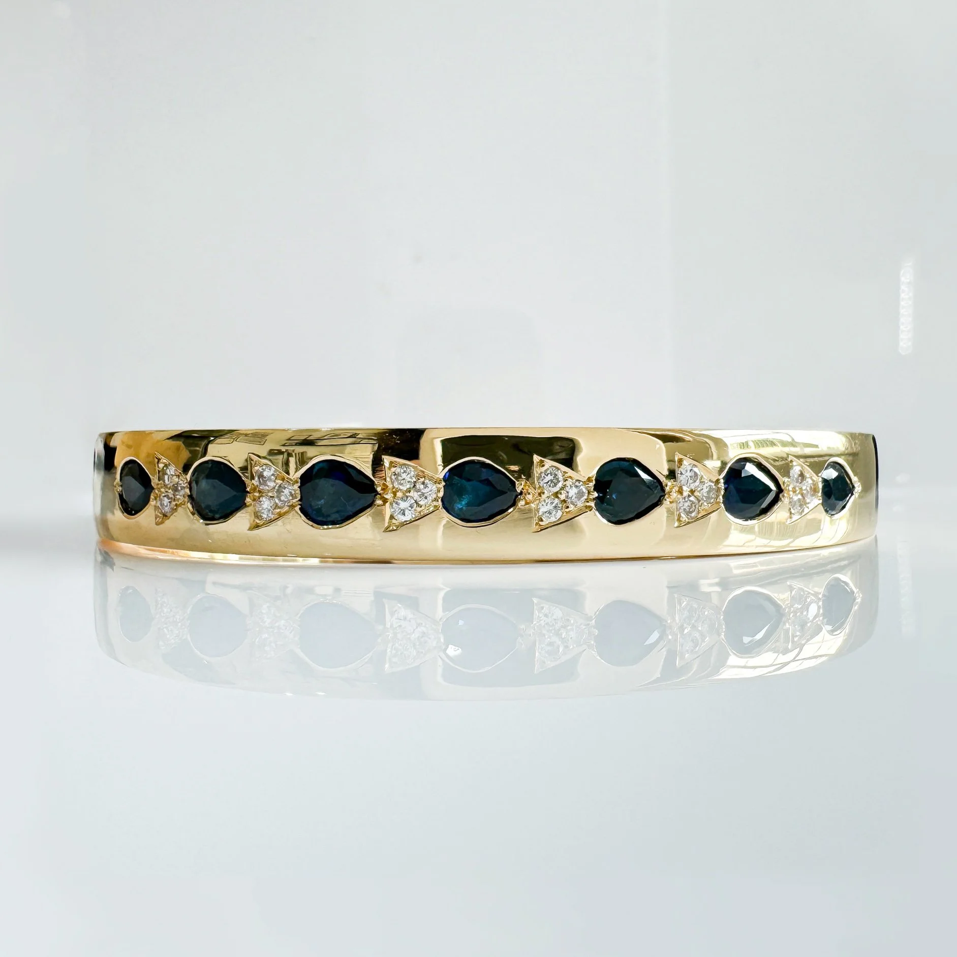 Diamond and sapphire bangle