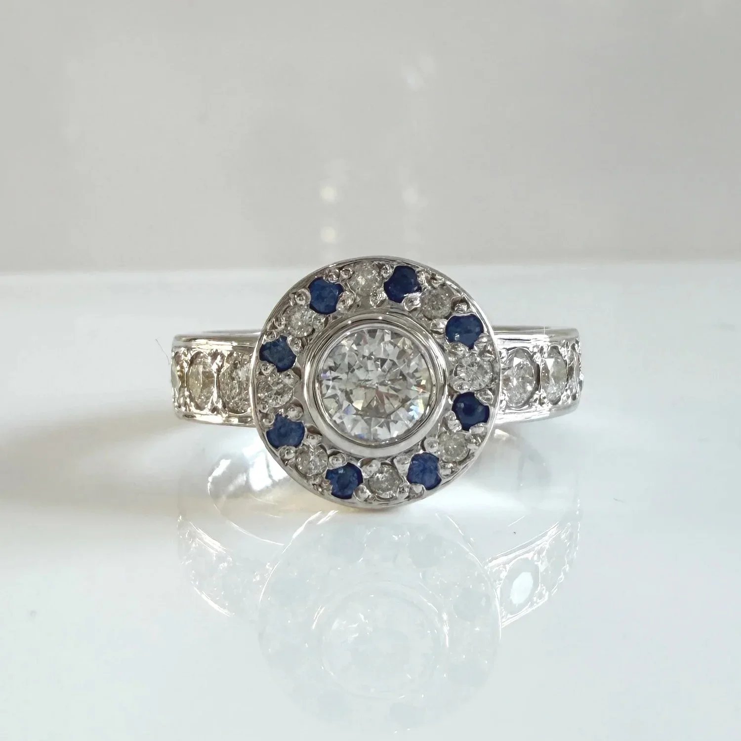 Sapphire and diamond halo ring