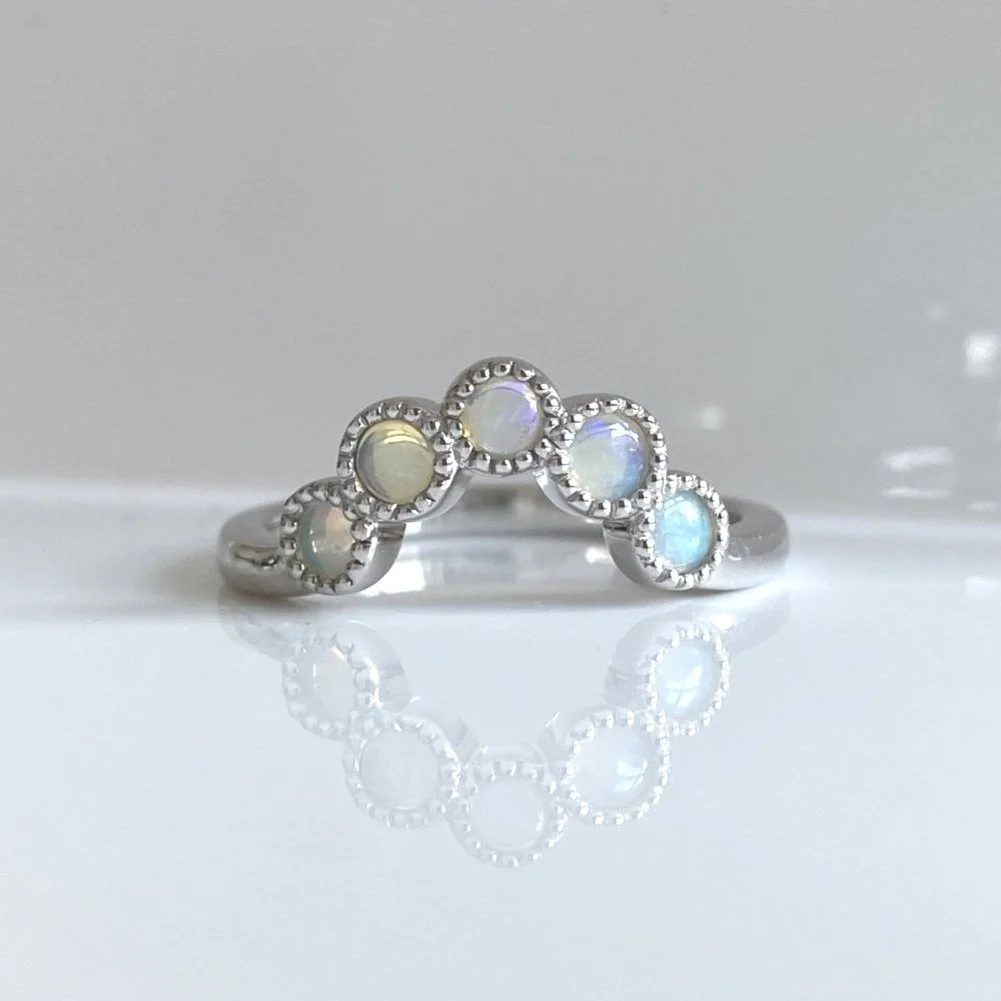 Vintage inspired opal shaped eternity