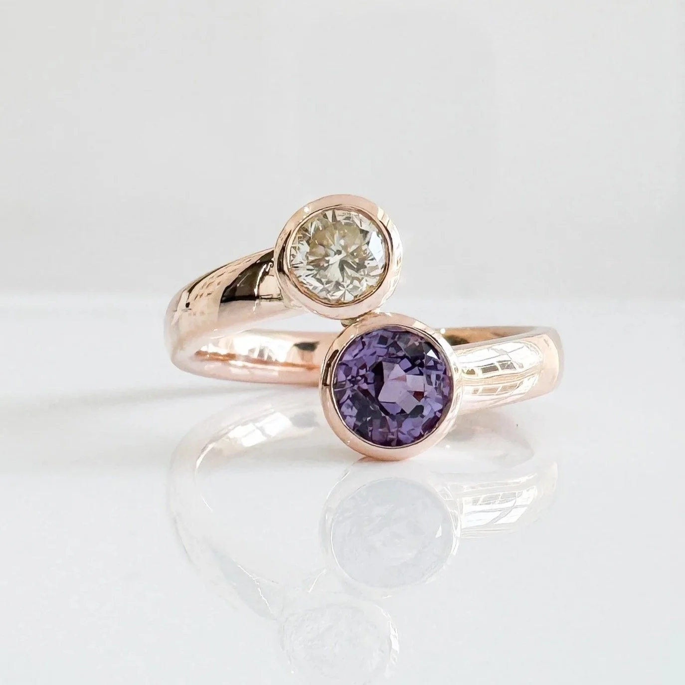 Cross over diamond and amethyst ring