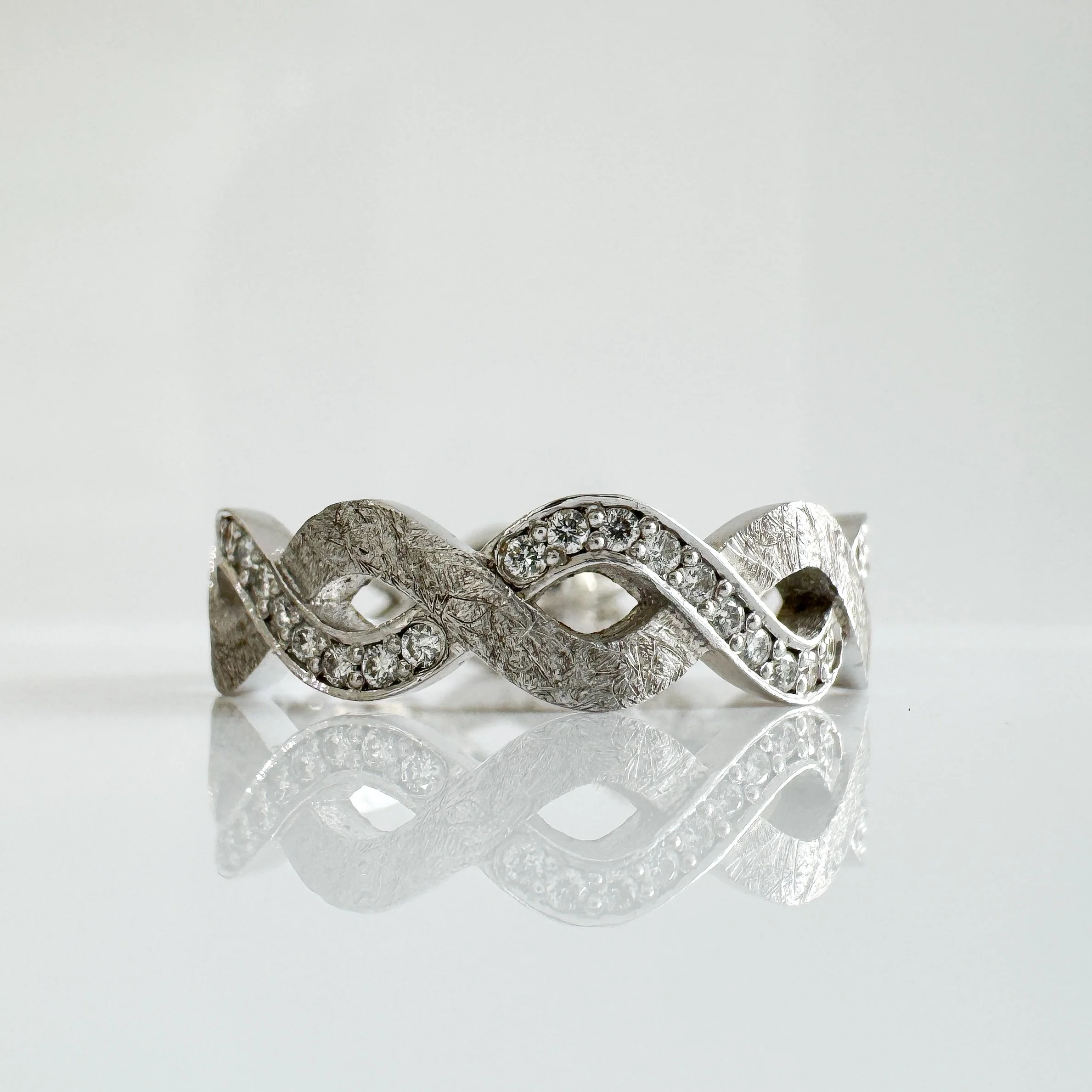 0.25ct White gold twist eternity ring