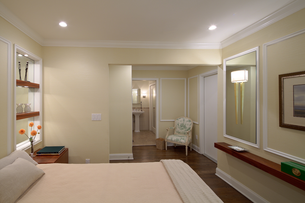 AFTER - GUEST BEDROOM (BY RELOCATING THE LAUNDRY, WE USED THE PLUMBING WALL TO CREATE A BATHROOM AND A NEW GUEST SUITE)