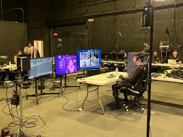 Tony The Tiger voice actor, Andy Nagraj, seen behind the scenes wearing full motion-capture gear while performing on a Twitch livesteam.