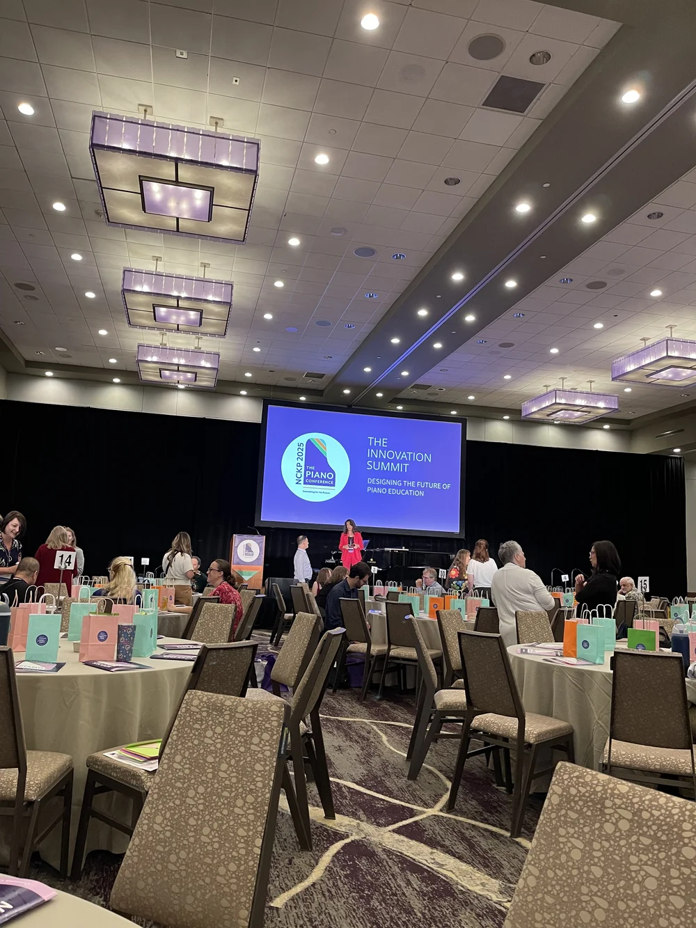  It looks like a wedding reception, but no, it's just piano teachers 