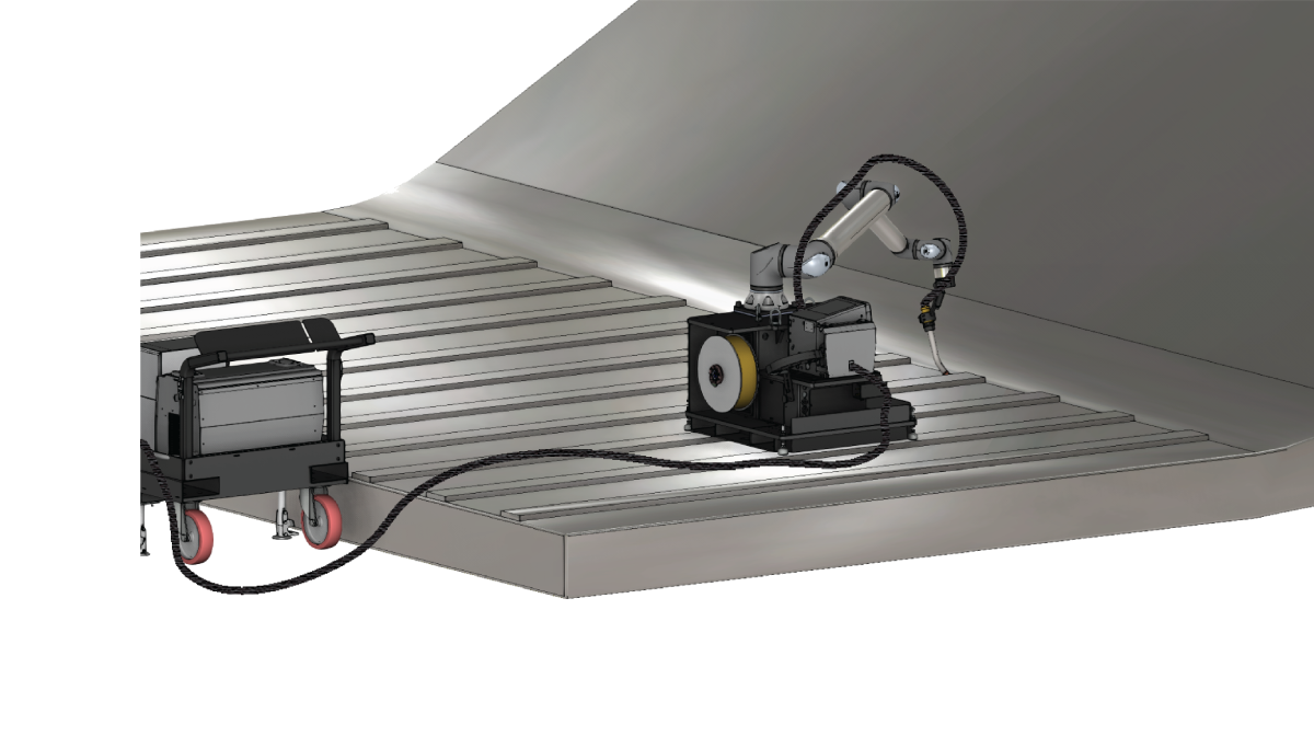 Vectis collaborative robot welding system set up to weld a large fabricated metal assembly.