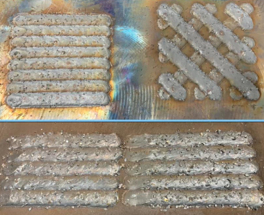 Drop carbide applied in parallel and crosshatched bead patterns on steel plate used in equipment fabrication.