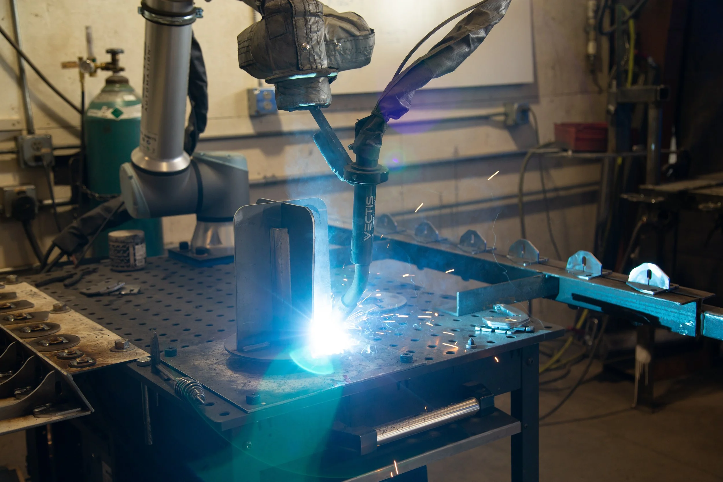 Vectis cobot welds a part at MT Solar fabrication shop