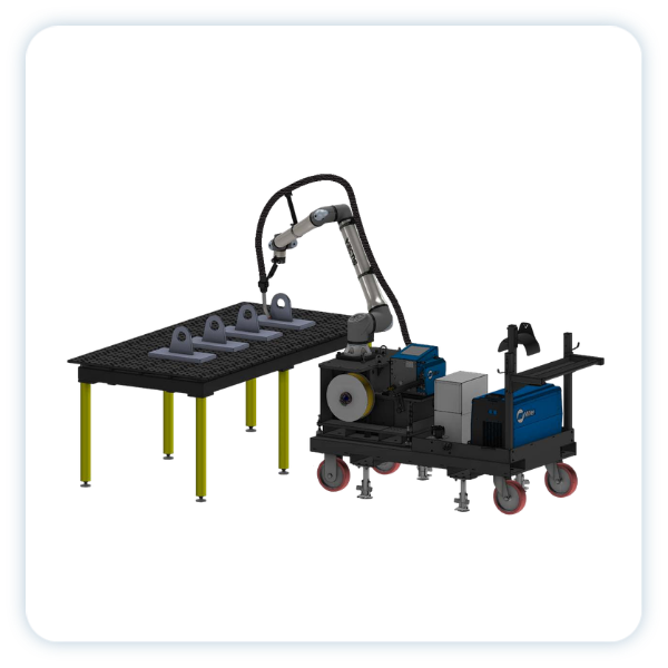 Robotic welding arm mounted on a wheeled cart beside a welding table with metal parts.