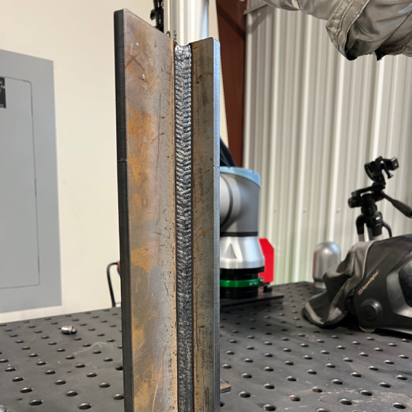 Vectis Vert-Up welding a vertical structural steel joint with .052 flux core wire.
