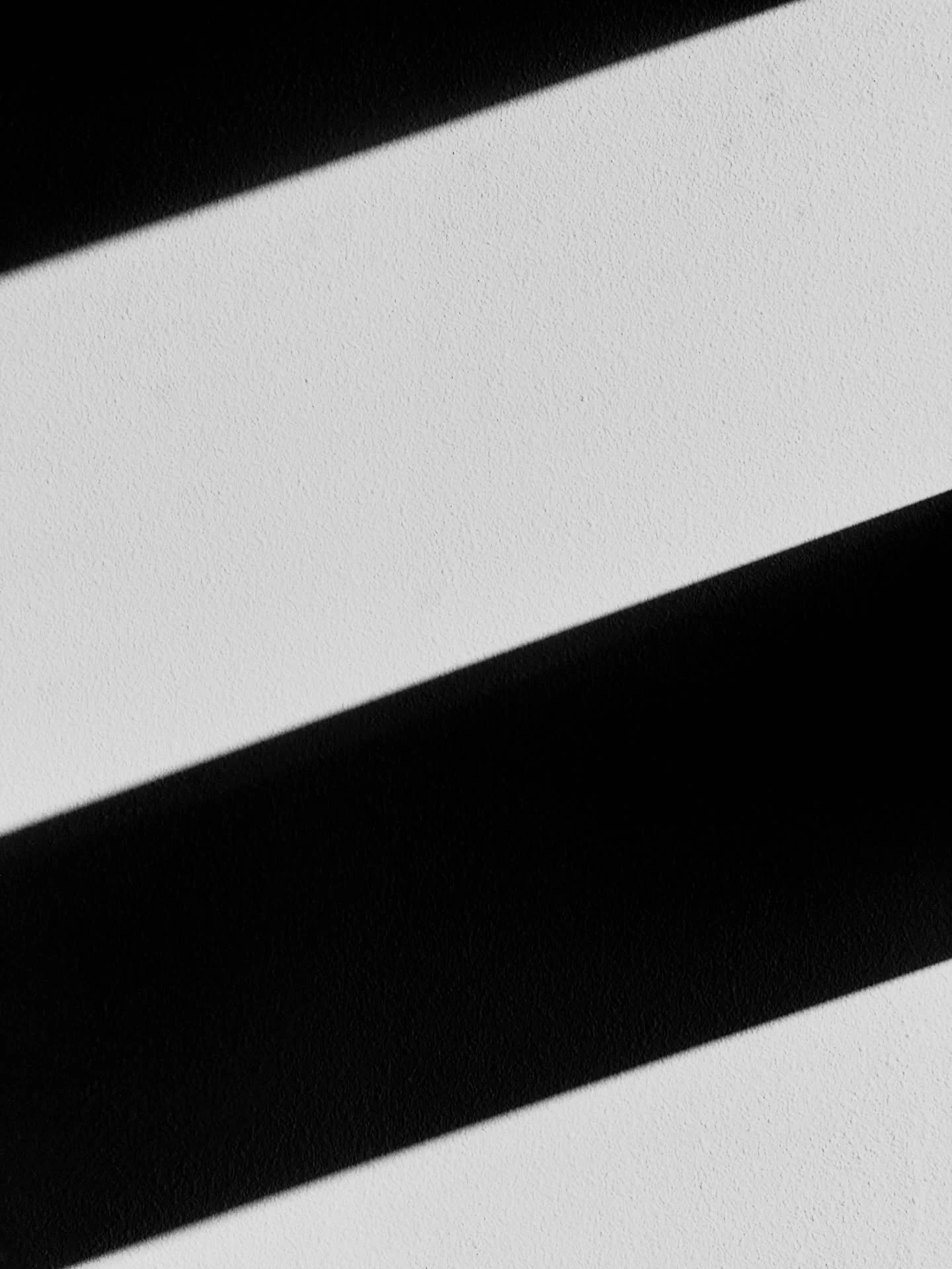 A patch of shadow and light should always make a photographer pause and take notice.  Especially in the depth of a Seattle winter. 

Shadows caused by the window frame on a spot of blank wall at home. 

#lightstudy #shadowandlight #searchforlight #vi