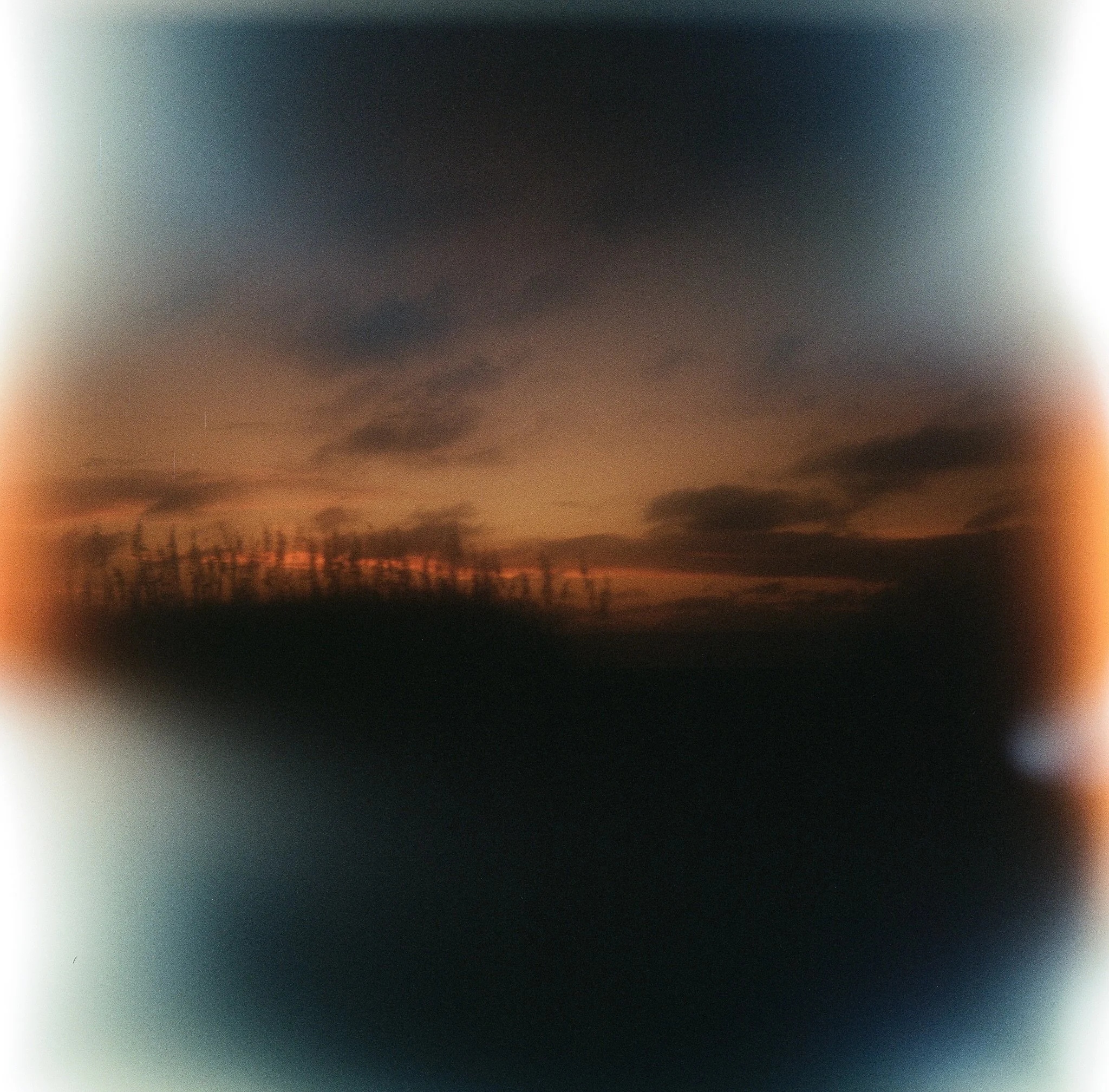 Unpredictably beautiful.  The back of my Kodak Duaflex popped open right after I took this photograph.  I closed it as quickly as possible, but I anticipated the roll would be a bust.  When I got the images back, this was the only image that showed a