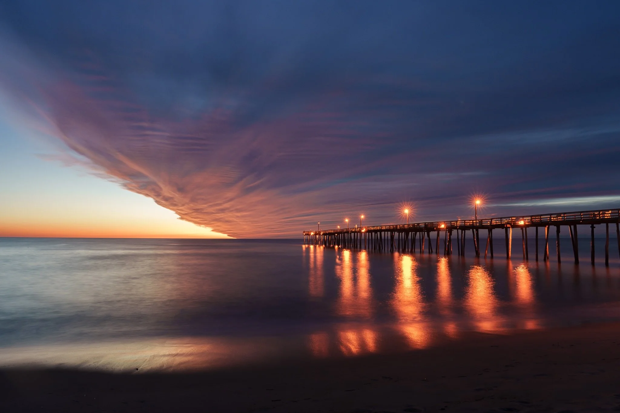Partly cloudy 🌤️

An incredible cloud deck as a frontal boundary moved in over the @nagsheadpierobx at sunrise last week. 

#sunrise #outerbanks #thesaltwaterretreat #photographyretreat