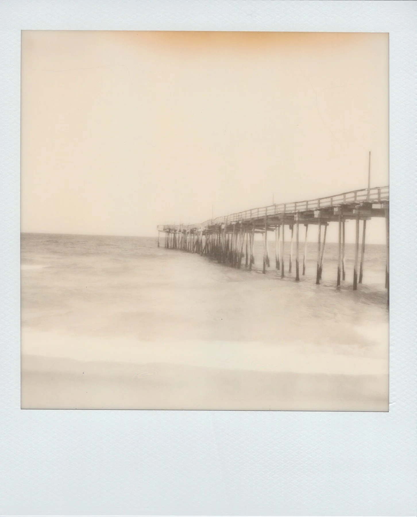 polaroid-sx-70-black-white-avon-fishing-pier-obx.jpg