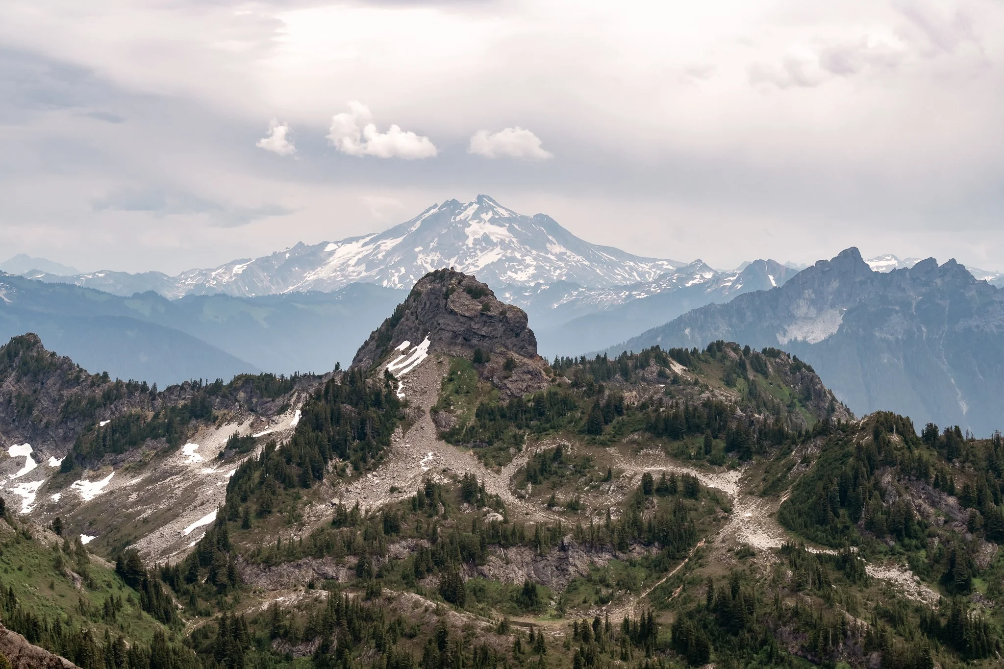 A view of Glacier Peak volcano and Mount Forgotten from the Mount Dickerman trail in the North Cascades of Washington.