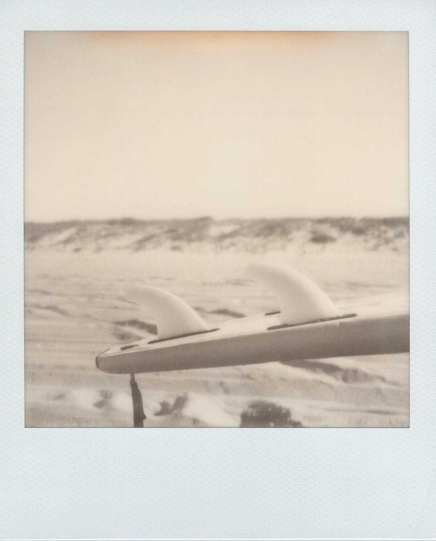 polaroid-sx-70-black-white-surfboard-frisco-obx.jpg
