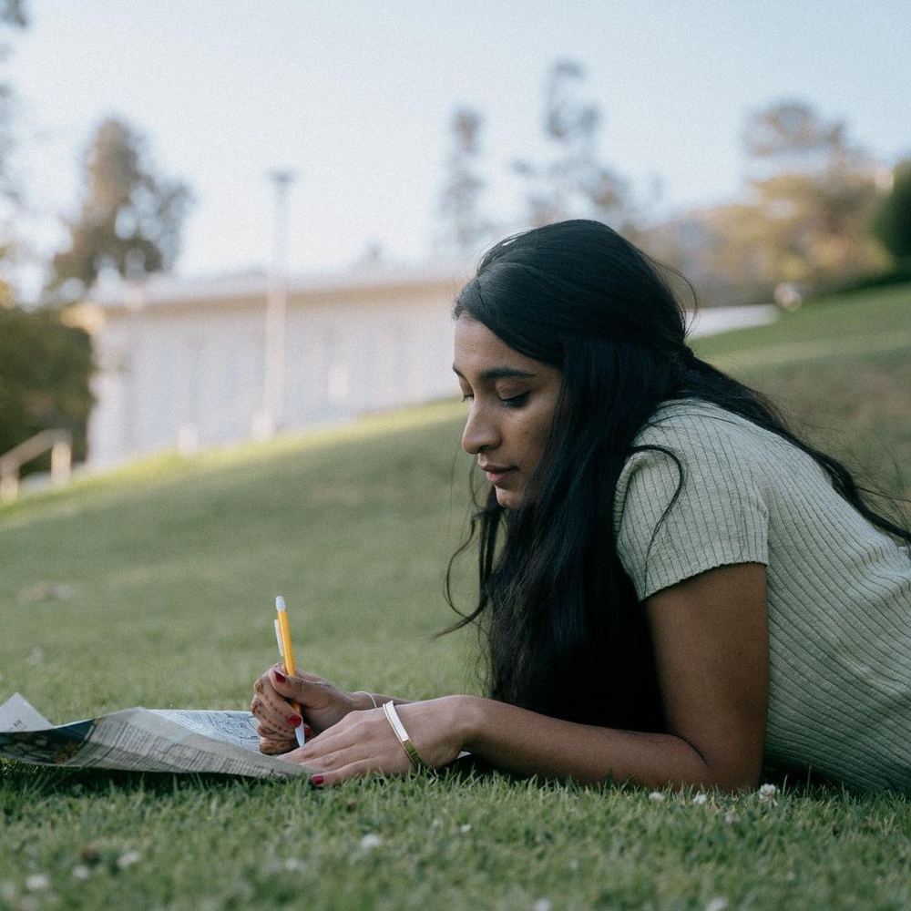 Lounge crossword clue