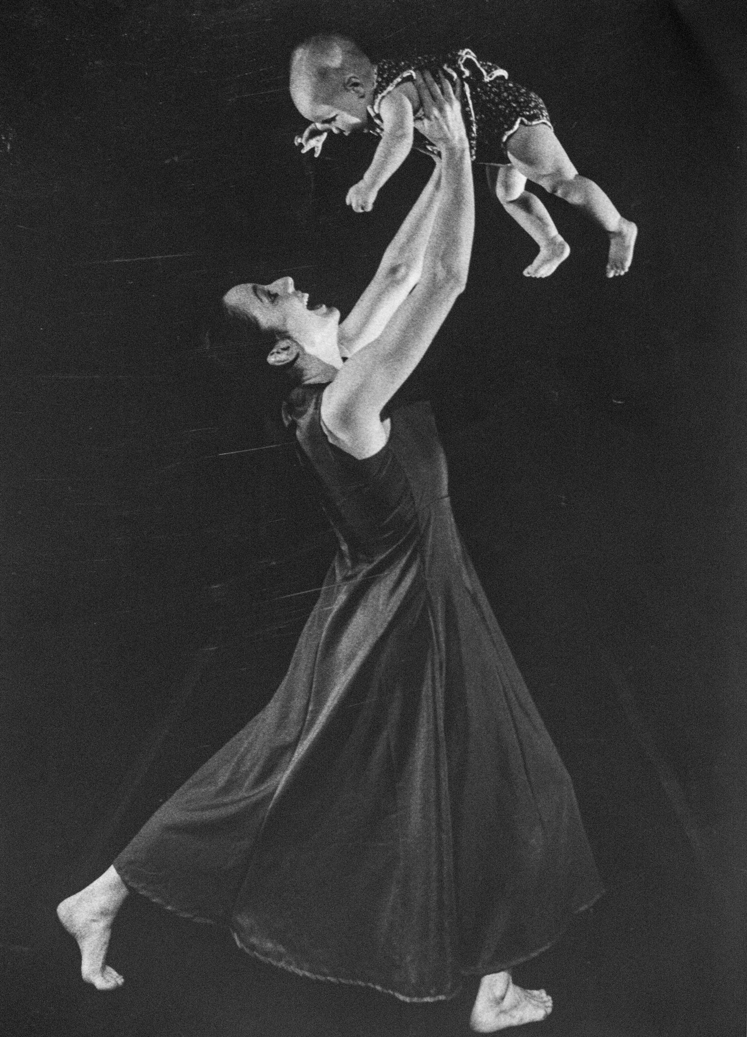 Michele dances with her daughter.