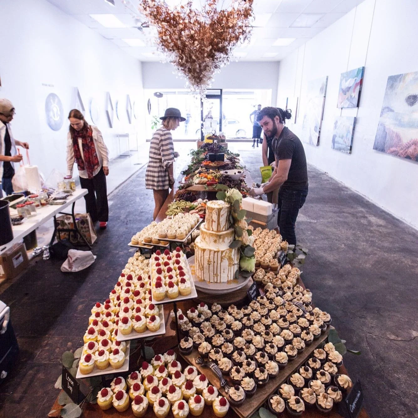 Catching your eye as centerpiece of the room, this amazing 16 foot spread was filled with everything we could have wanted. @roamthebar absolutely KILLED it with two tiers of meats, cheeses, fruits, veggies, etc etc. 
From the beginning, we had them i