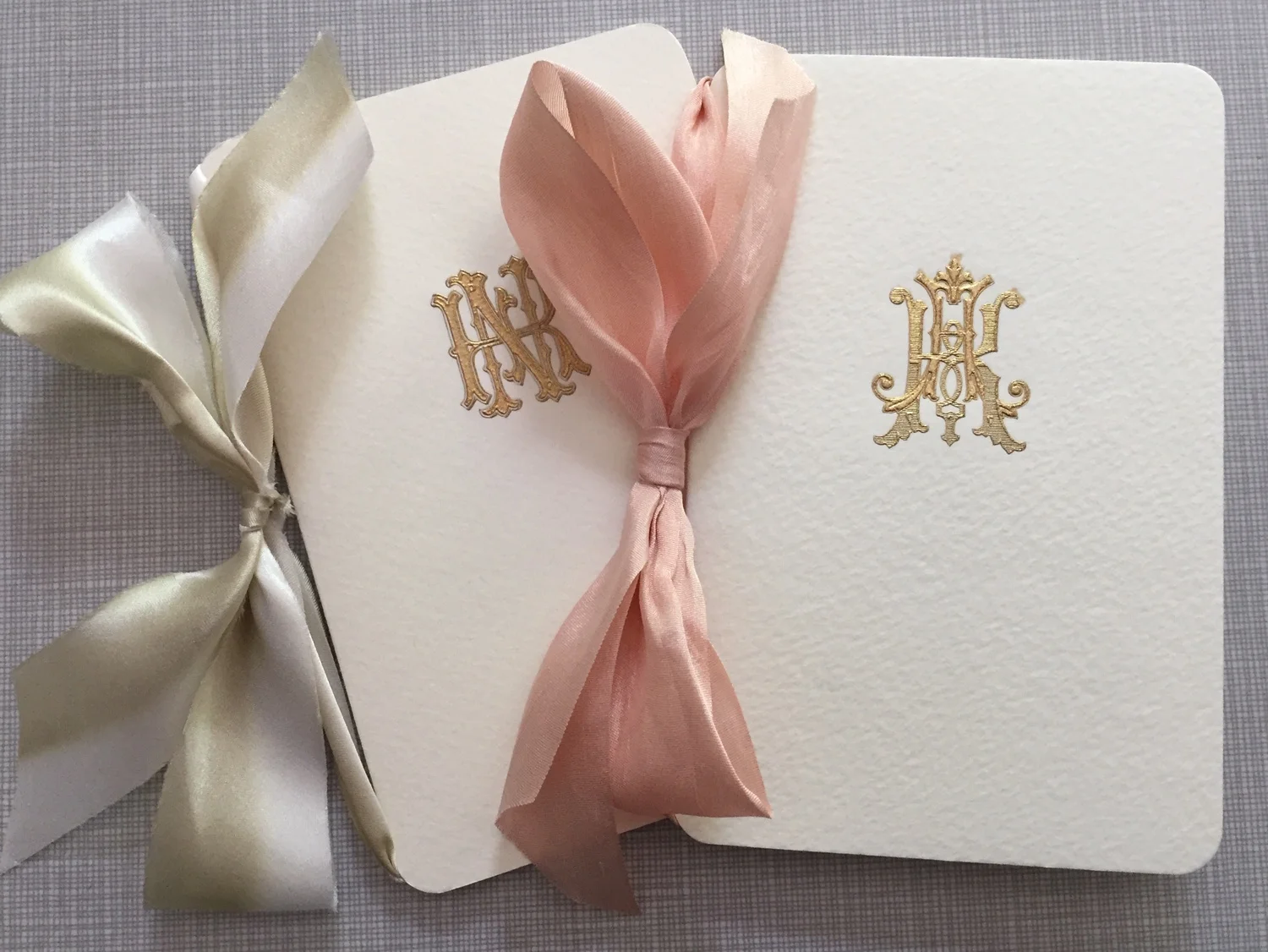 Wedding programs for Nicholas Saban (left) and Kristen Saban (right).