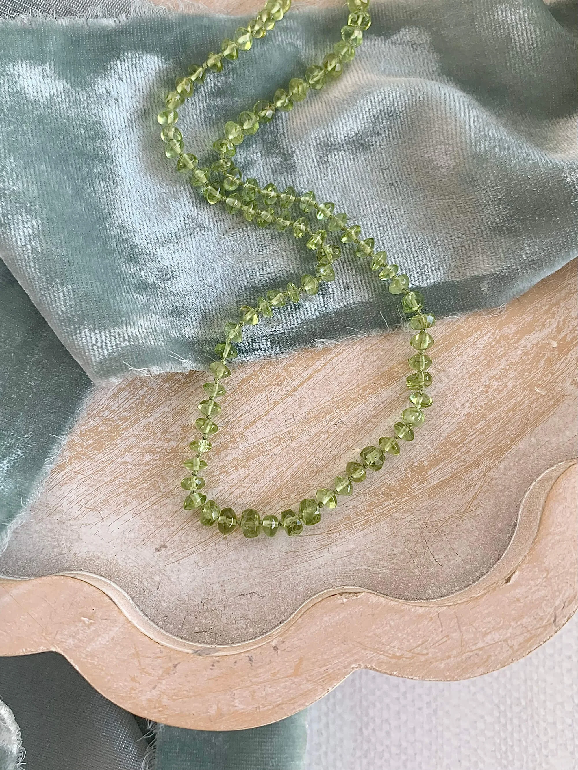hand knotted peridot cabachon silver strand $89.00 code kj-peridot.jpg