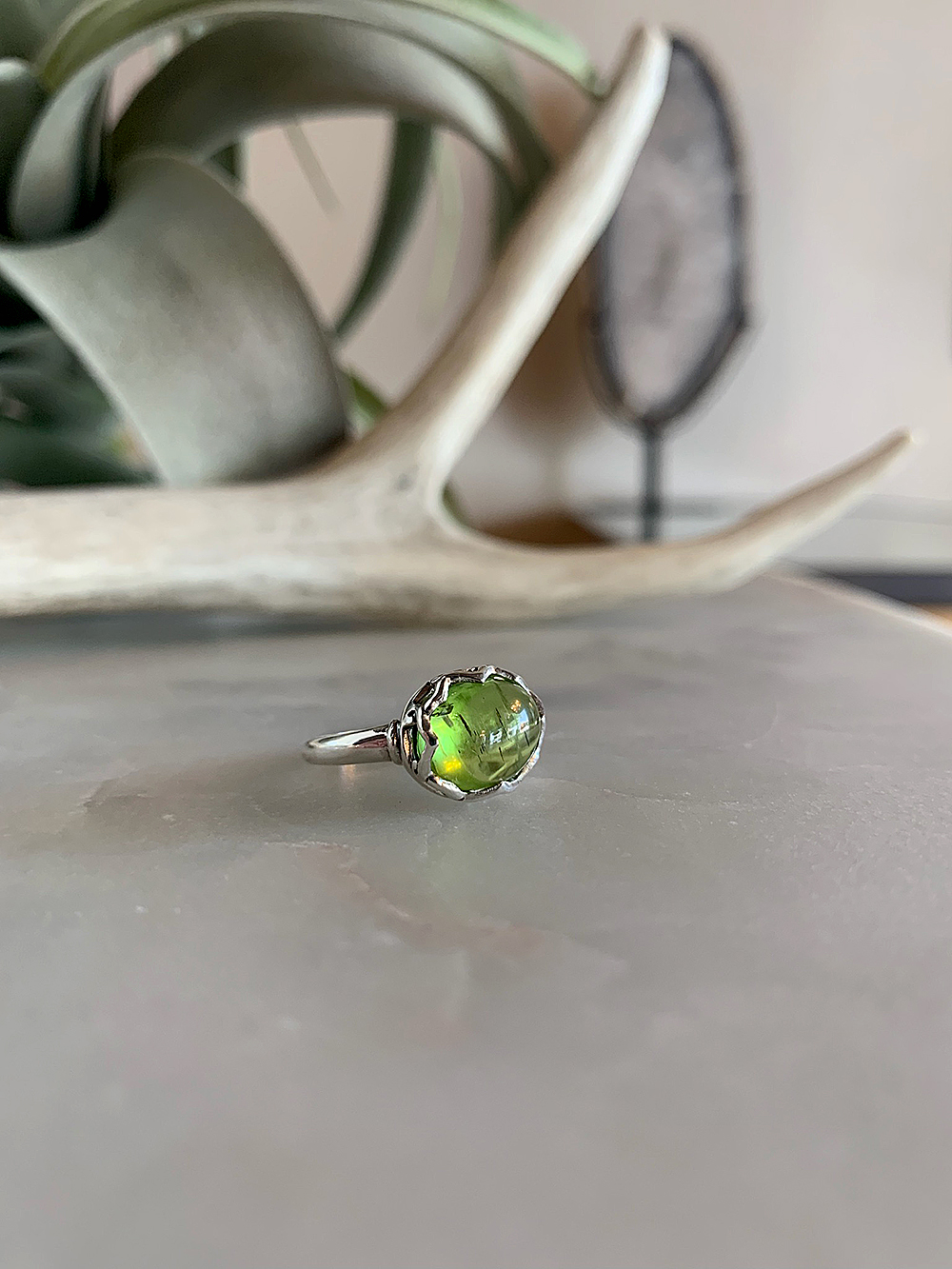 sterlingsilvercabachonperidotring-faceon$64_web.jpg
