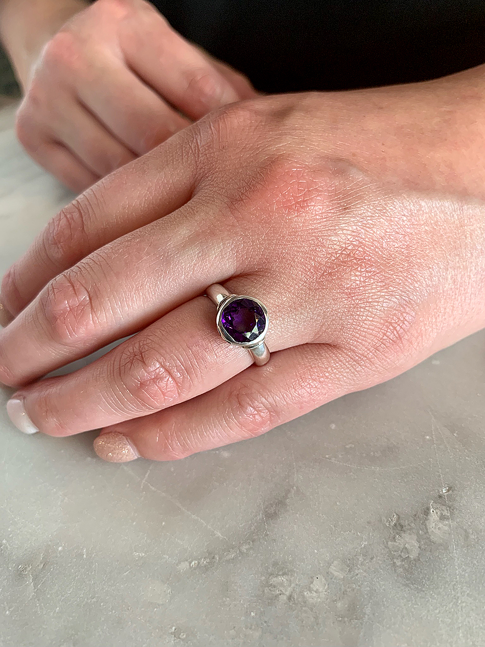 sterlingsilverroundamethystring-hand$70_web.jpg