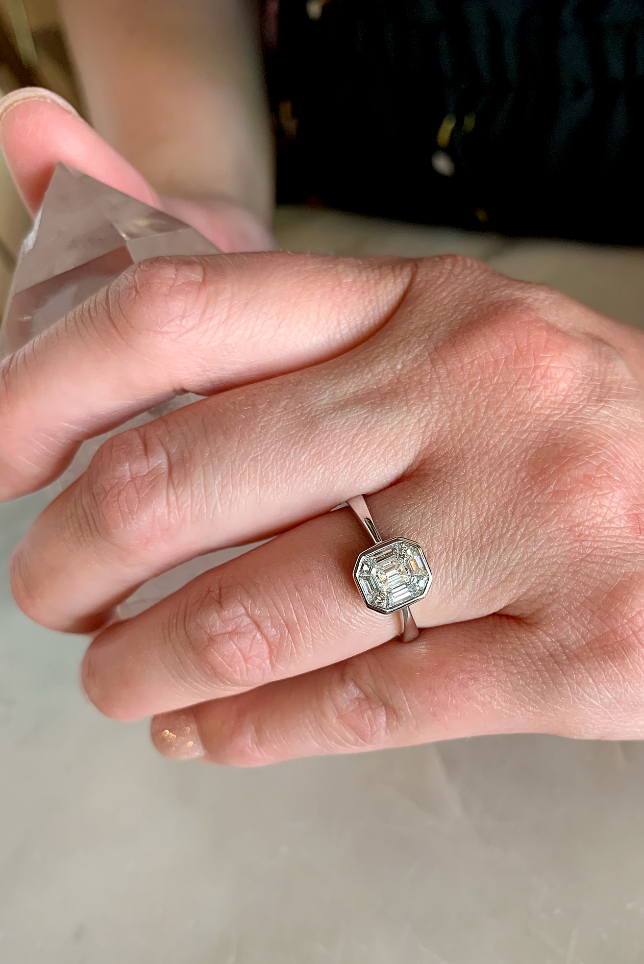 18kwhitegoldinvisiblesetdiamondengagementring-$3970-codert-r05248-handview_web.jpg