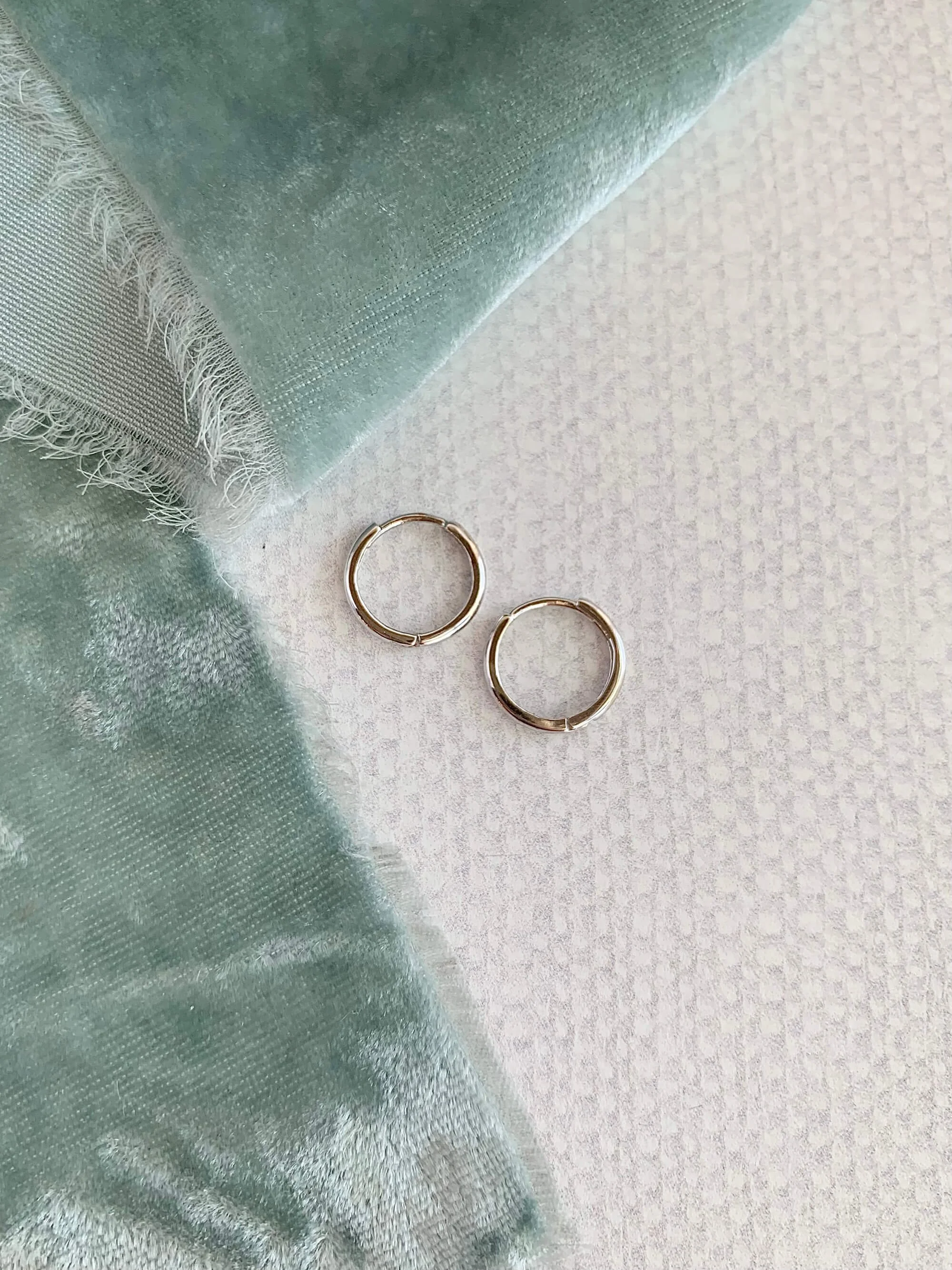 Will Travel 14k White Huggie Earrings