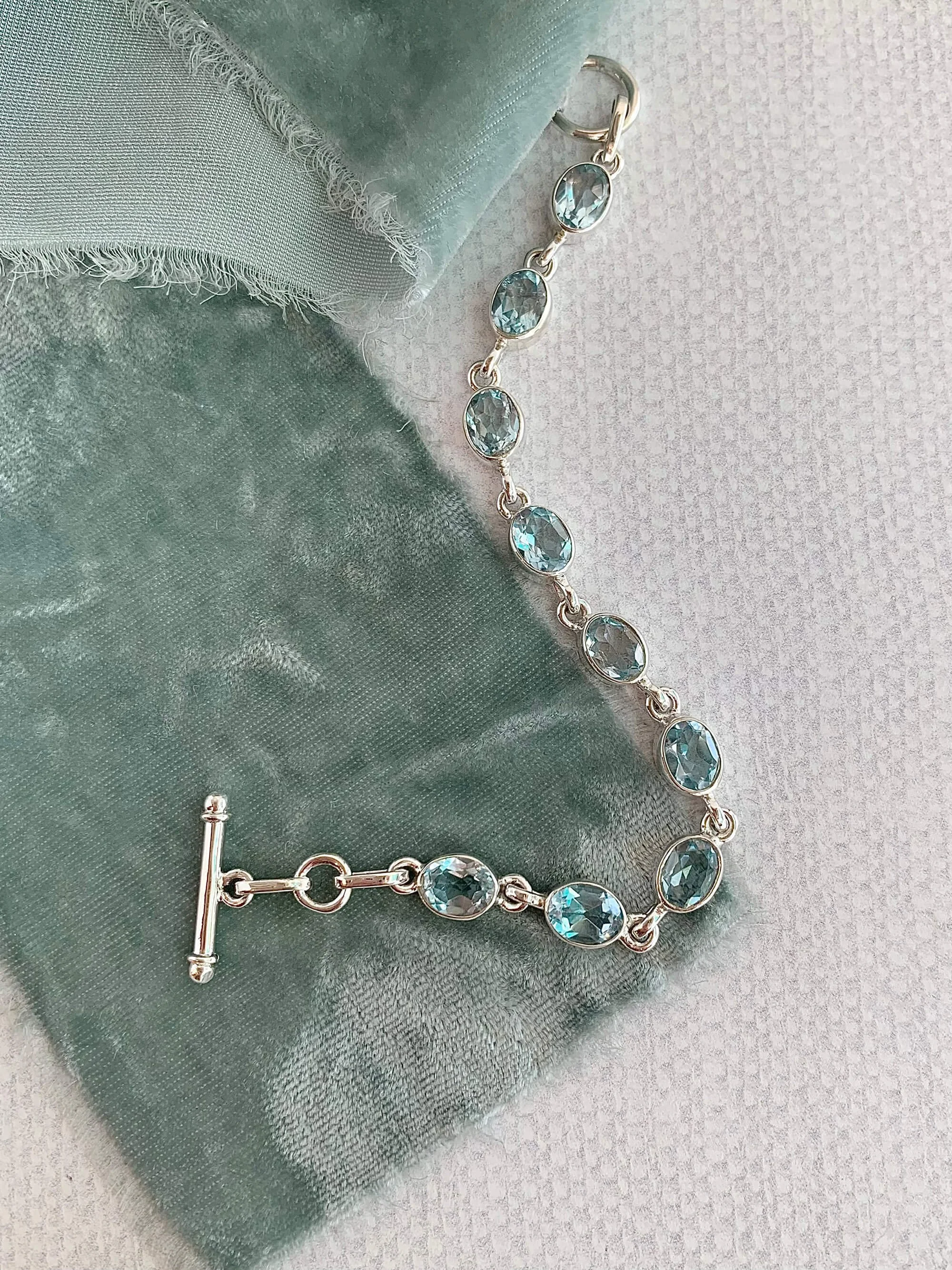 Oval Blue Topaz Silver Bracelet