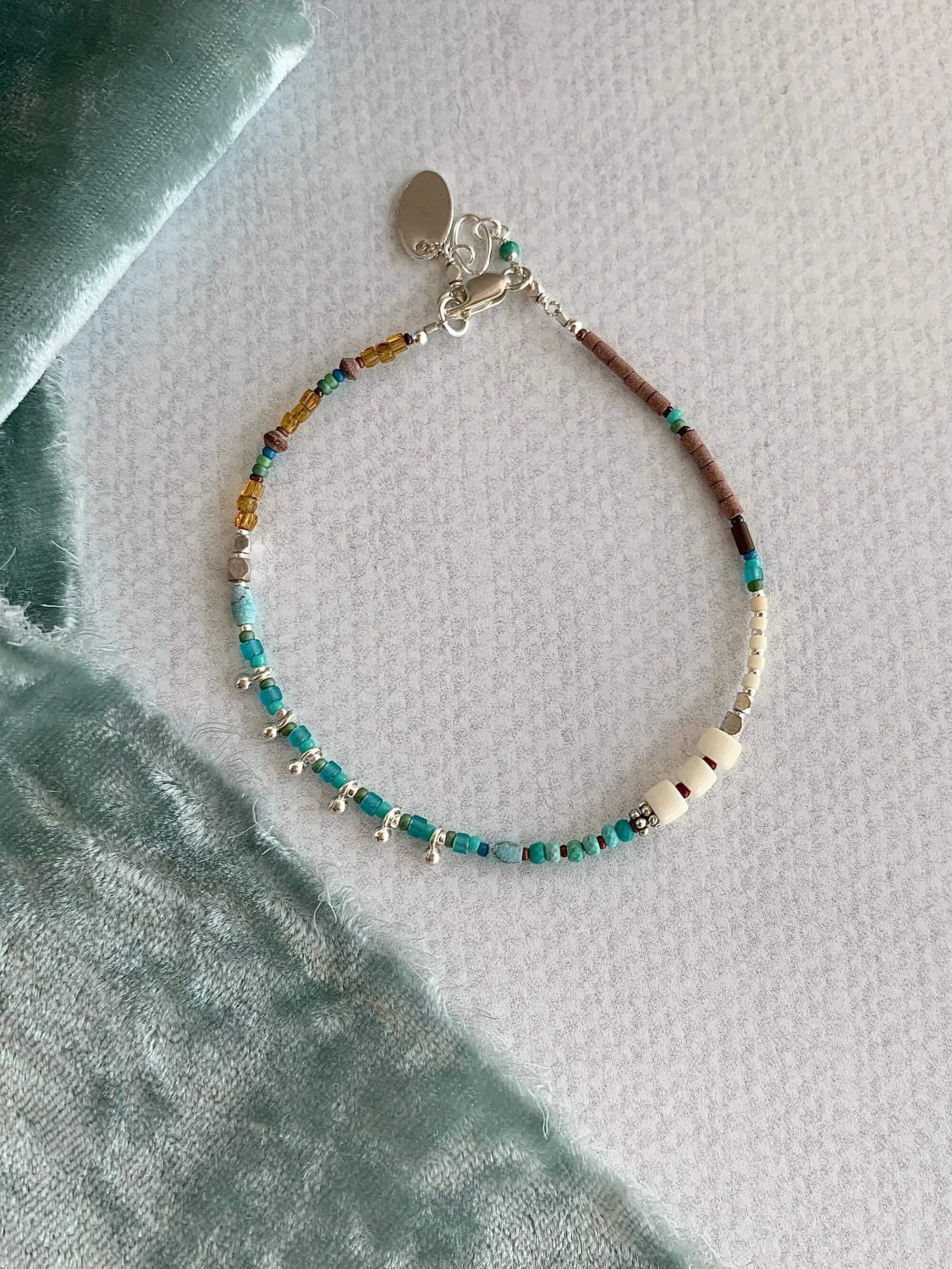 Turquoise, Bauxite, Faiance, Bone Silver Bracelet