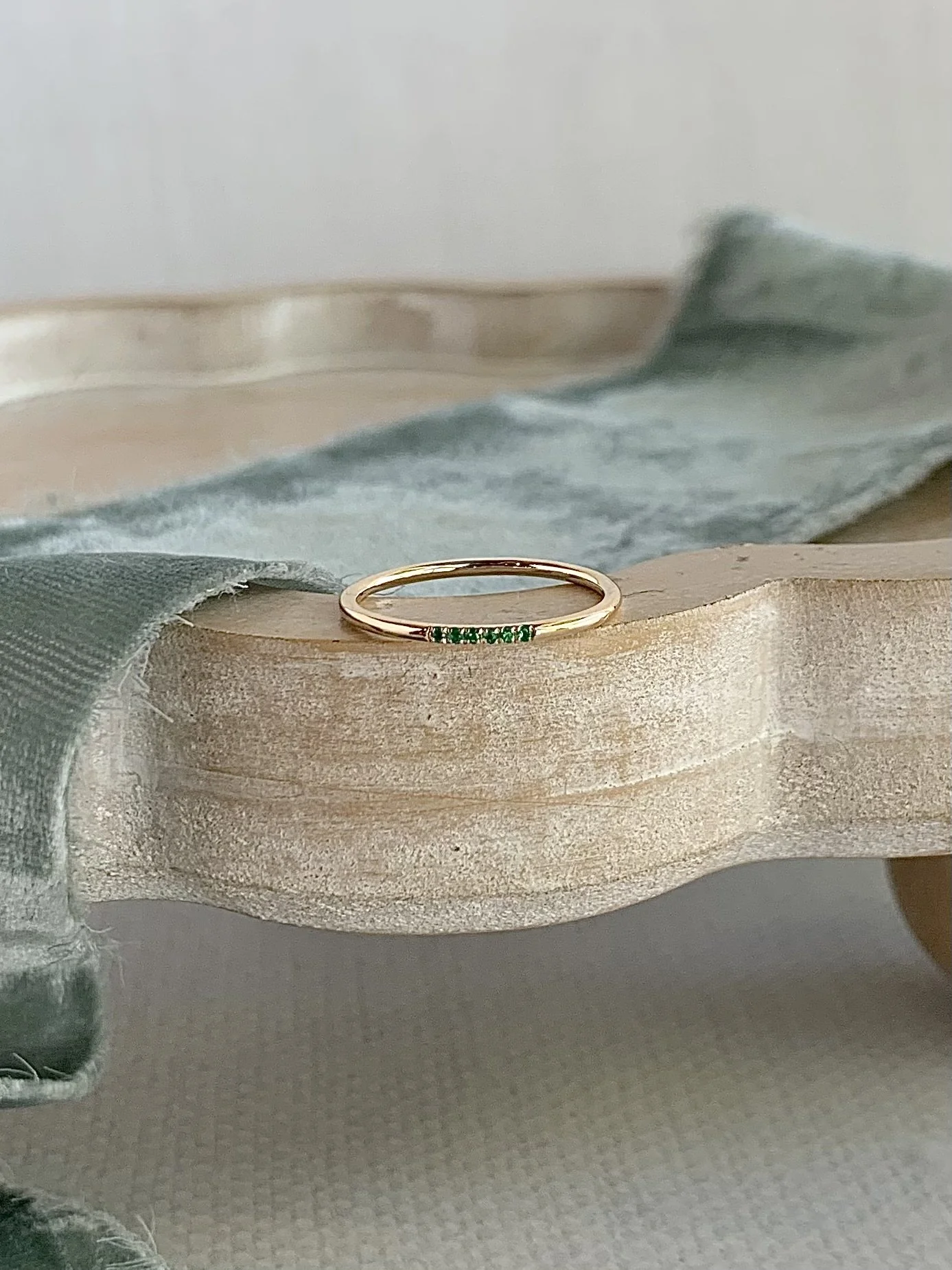 dainty emerald 14k yellow stacker $564.00 code ajr62495.jpg
