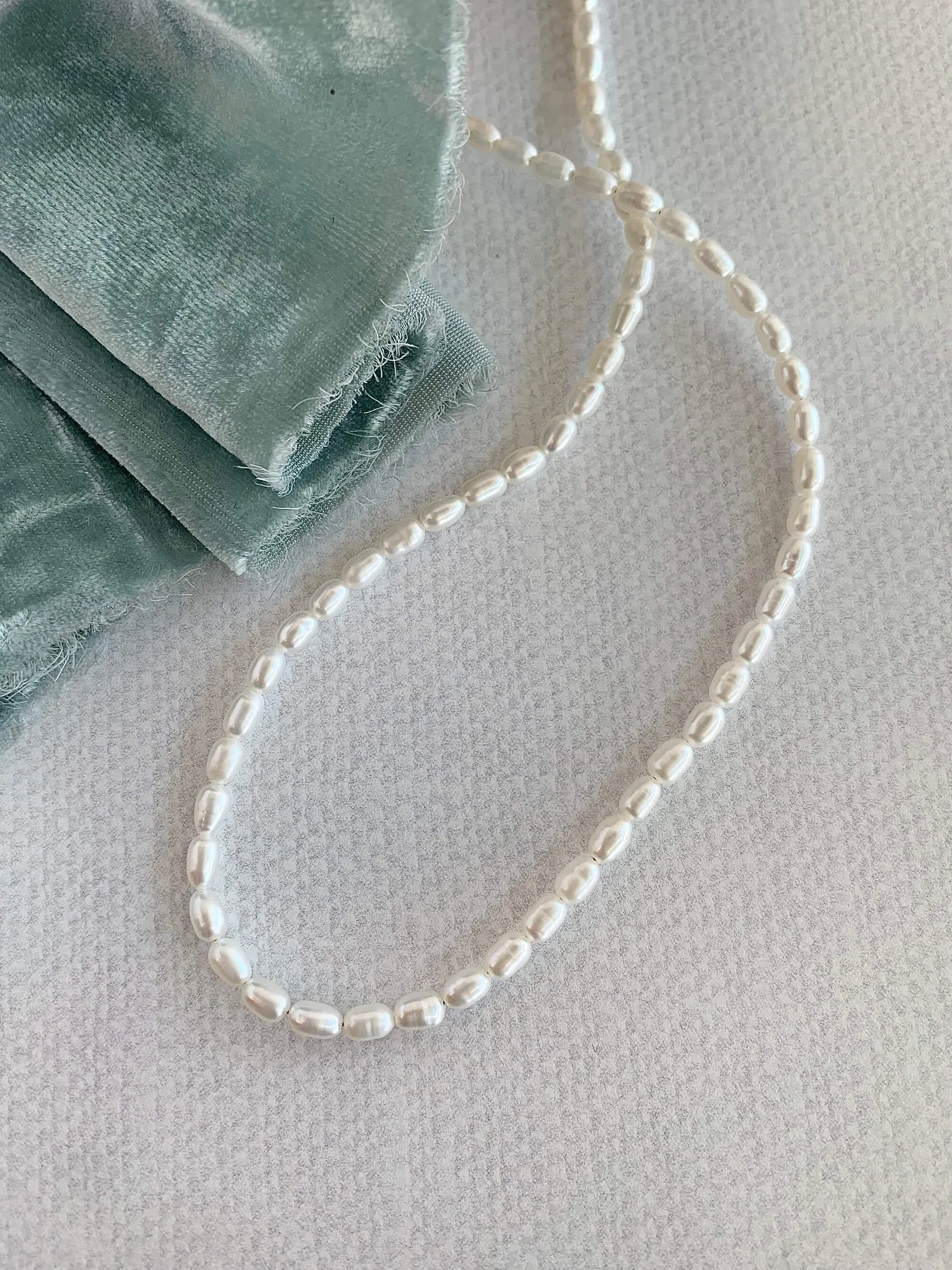 Elongated Freshwater Pearl Silver Strand