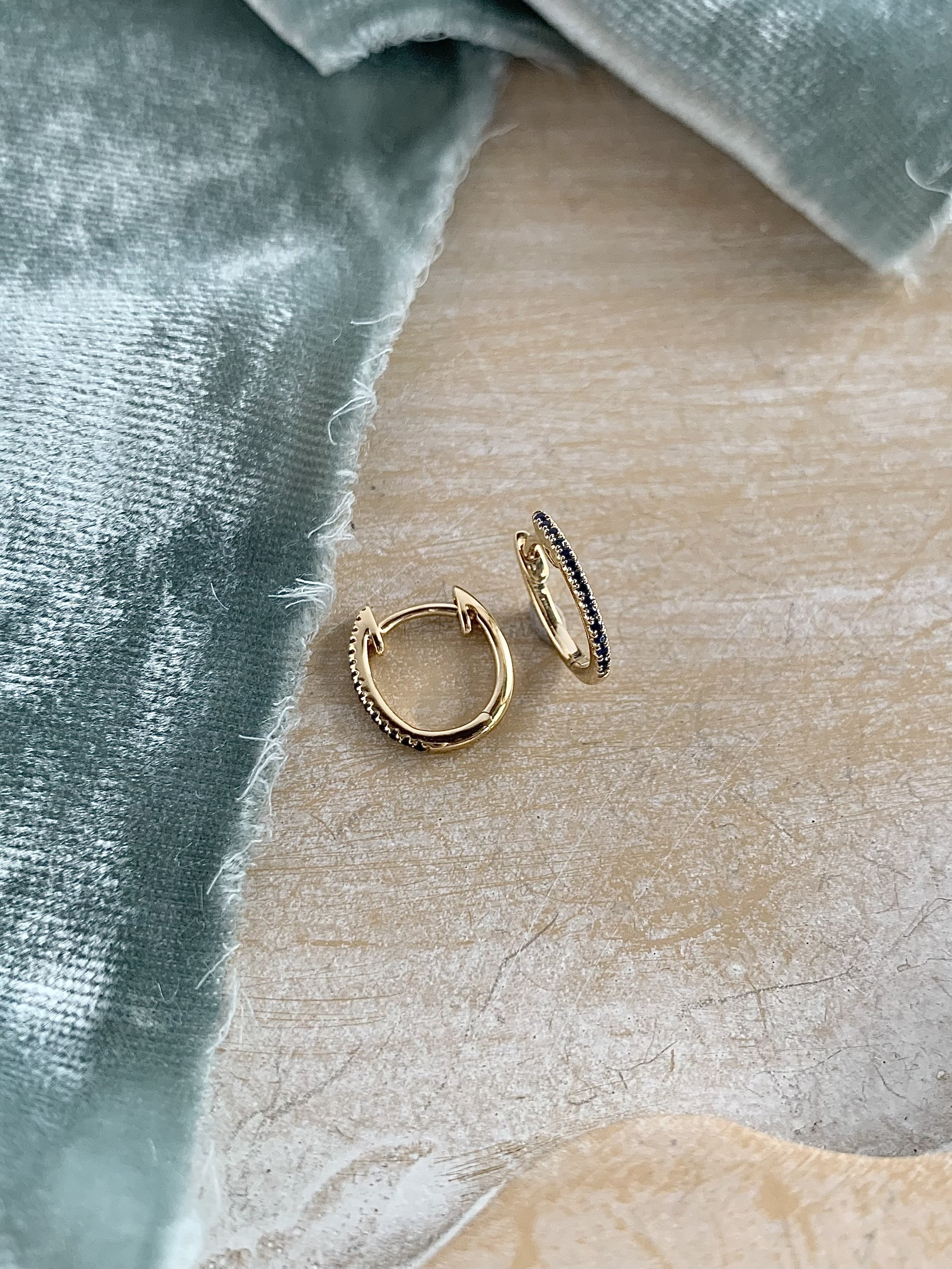 all sapphire dainty 14k yellow huggie $896.00 code e8003-14k.jpg