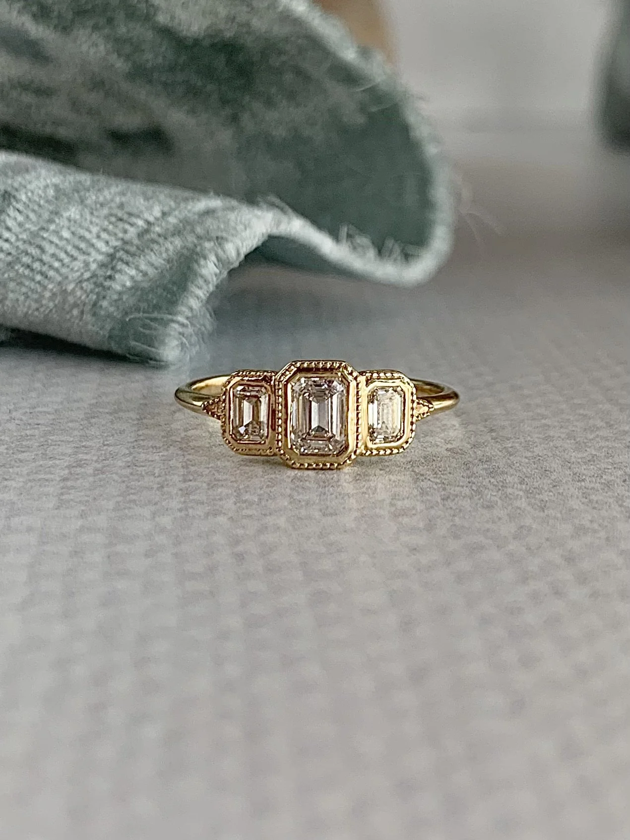 Caprice Emerald Cut Diamond .76ctw trio 14k Yellow Gold Engagement Ring