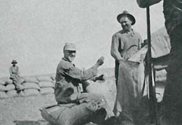 John Dodson sewing wheat bags, Bickleton, 1920 Courtesy Glancing Back Through The Years