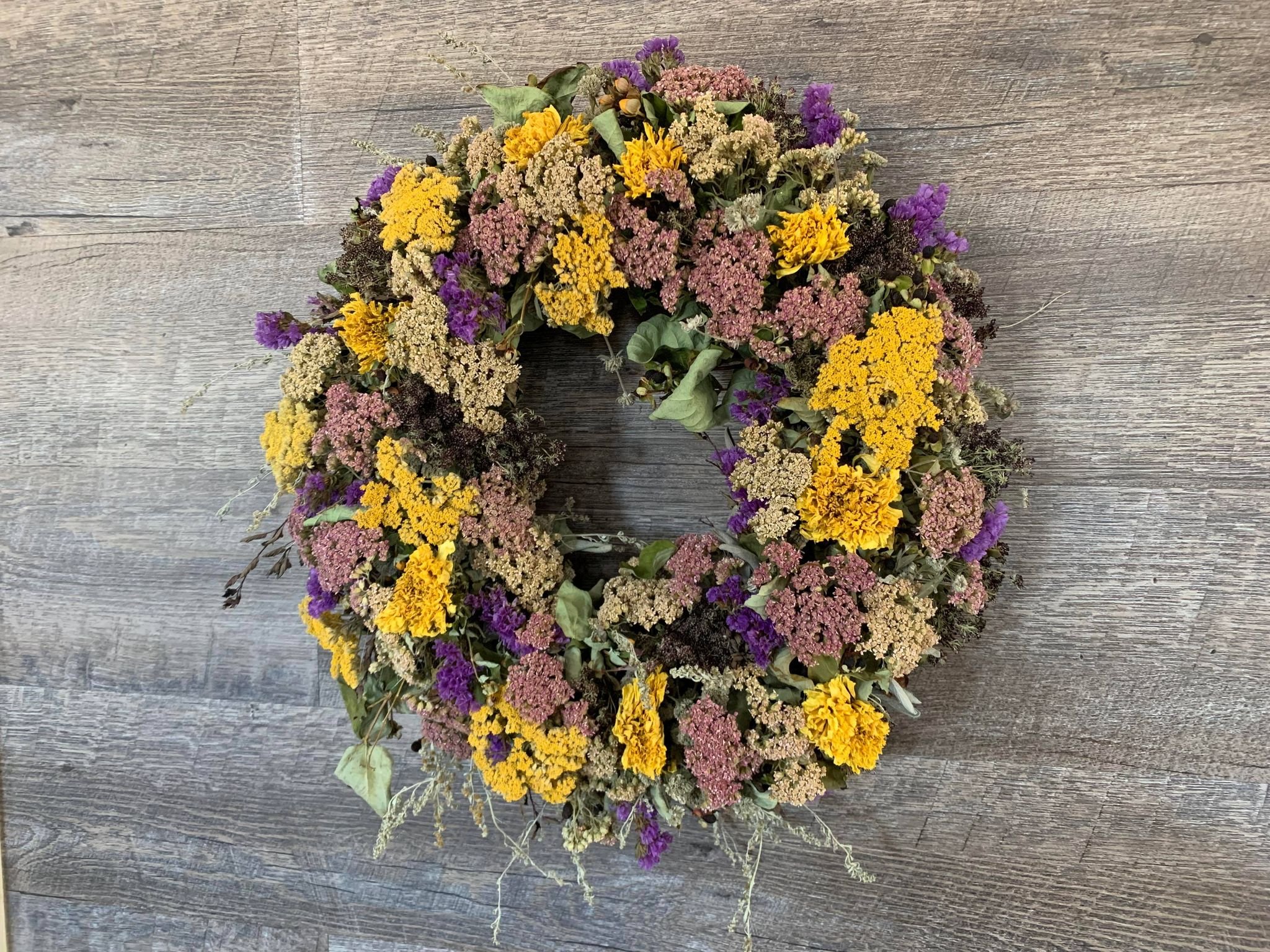 Dried floral wreath $65