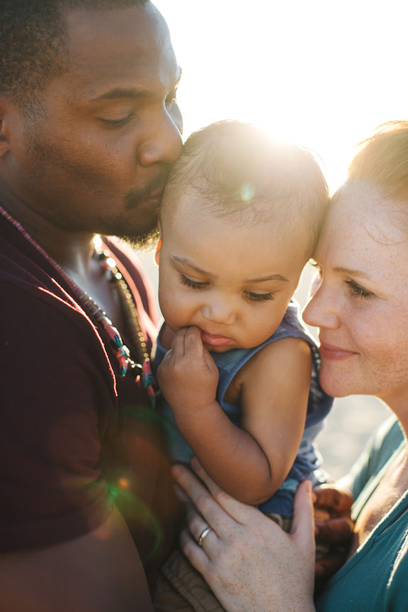 Happy Couple with their baby after conceiving with the help of fertility treatments