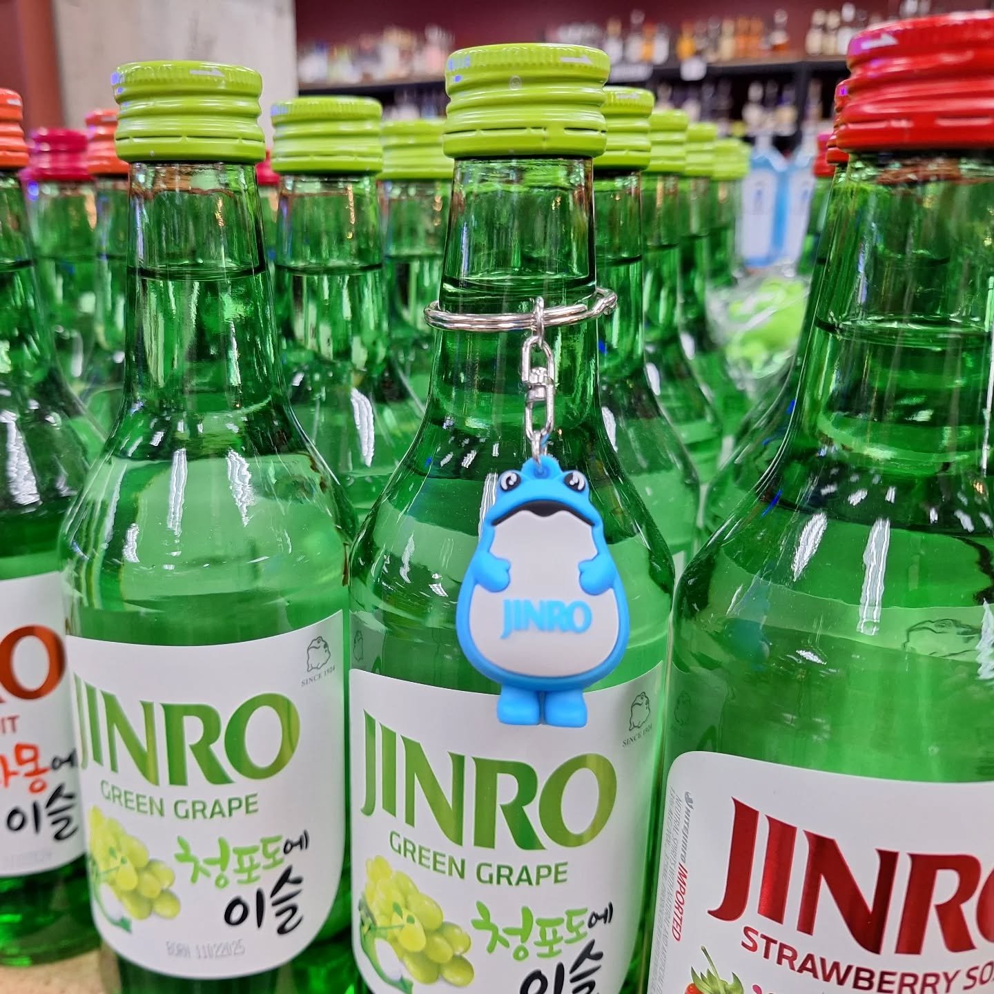 We have some fun keychains for anyone who buys a bottle of @official.jinro #soju right now. Look at that adorable li'l toad. #ontherocksliquor #lawrenceks