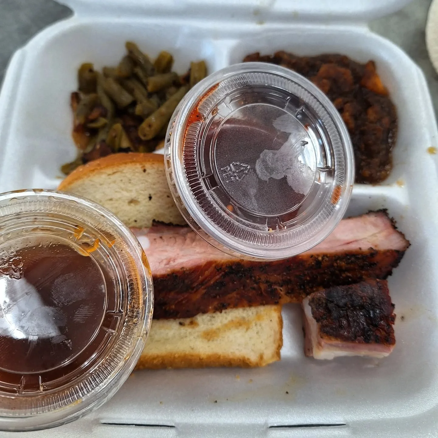 We got a sneak peek at @phatkennysbbq this afternoon &amp; let's just say the haba&ntilde;ero bourbon sauce will knock your socks off in the best possible way. #ontherocksliquor #lawrenceks #bbq